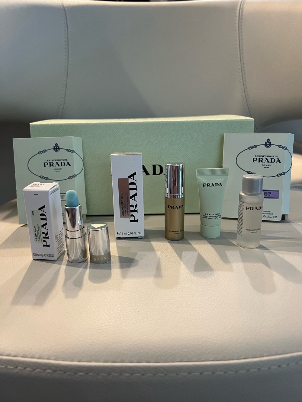 NIB PRADA Bundle Augmented Skin Serum, Lotion, Hand Cream, Balm Blue, Gift Box